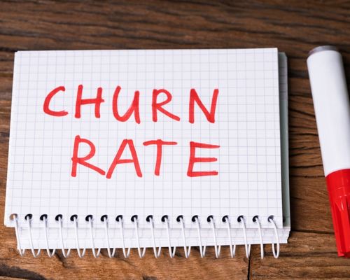 Churn Rate écris sur un cahier 